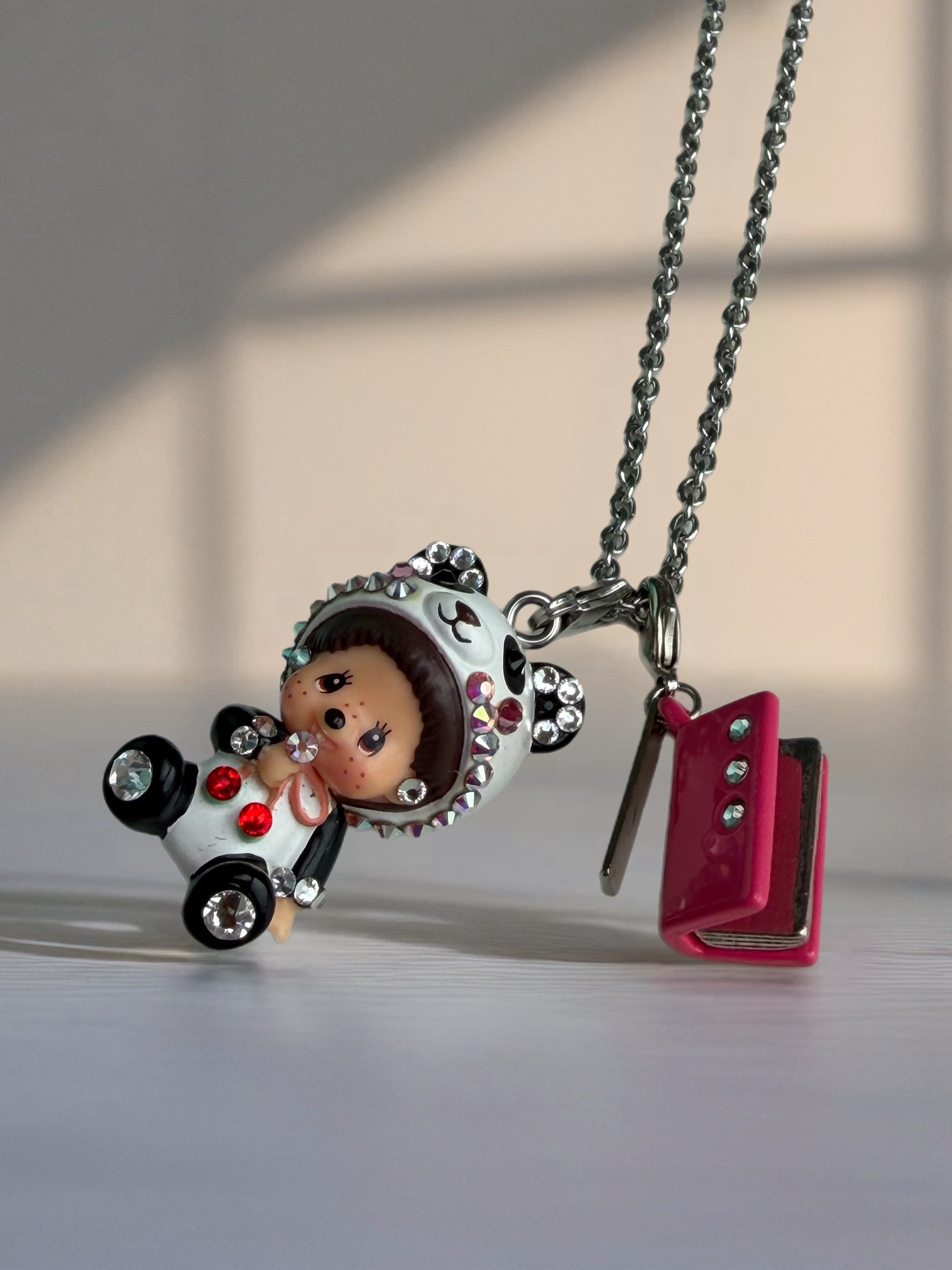 Necklace and additional charms not included. For display purposes only.